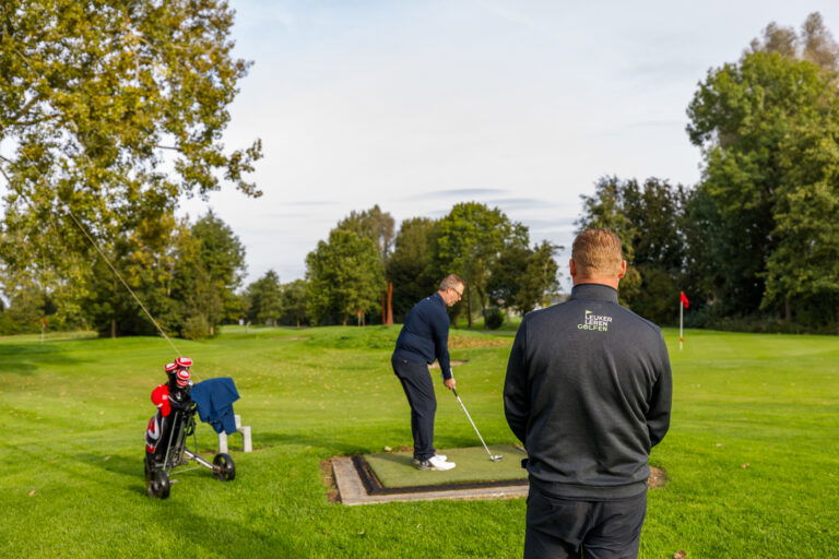 Golfles in de baan